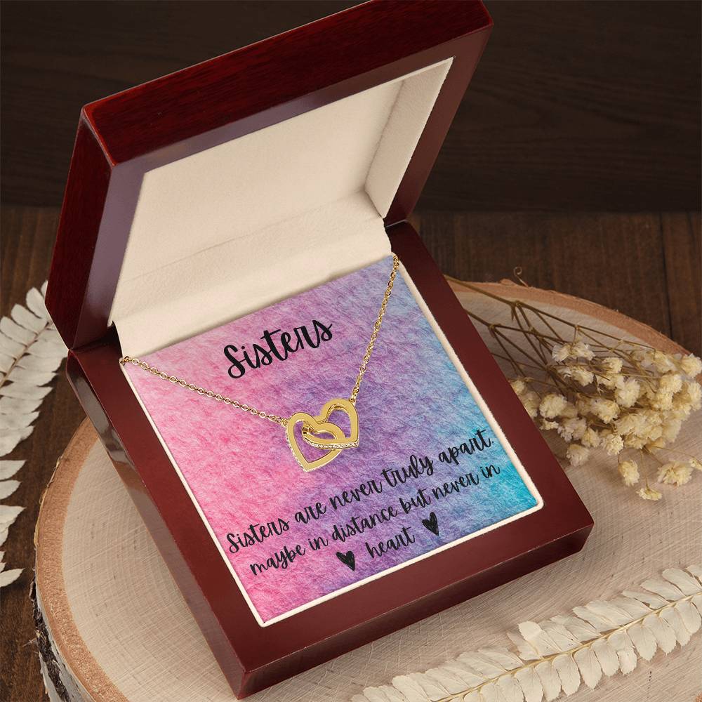 Sisters - Interlocking Necklace - Rainbow Background Interlocking Hearts Necklace